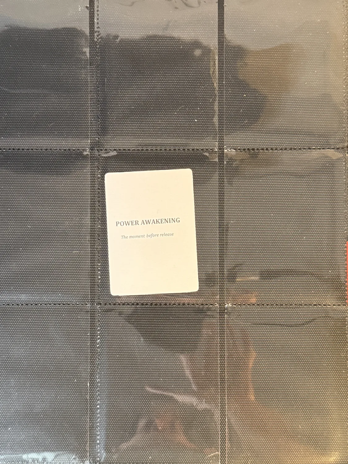 Power Awakening chapter divider card seated in a binder page