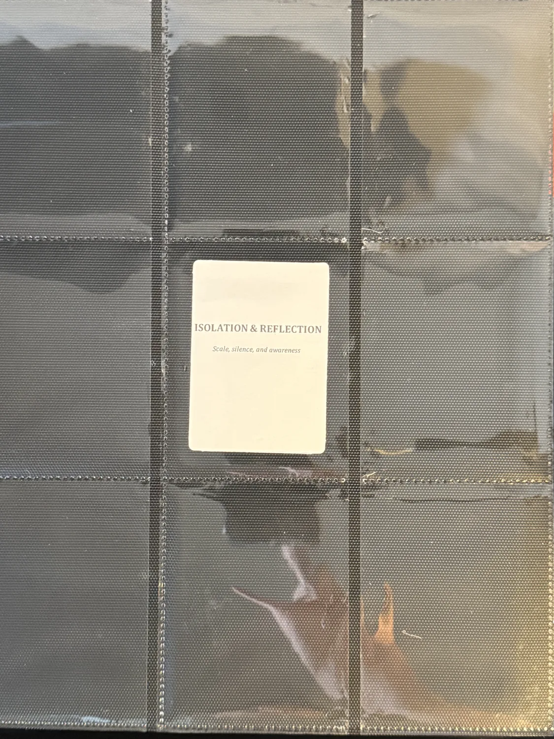 Isolation and Reflection chapter divider card seated in a binder page