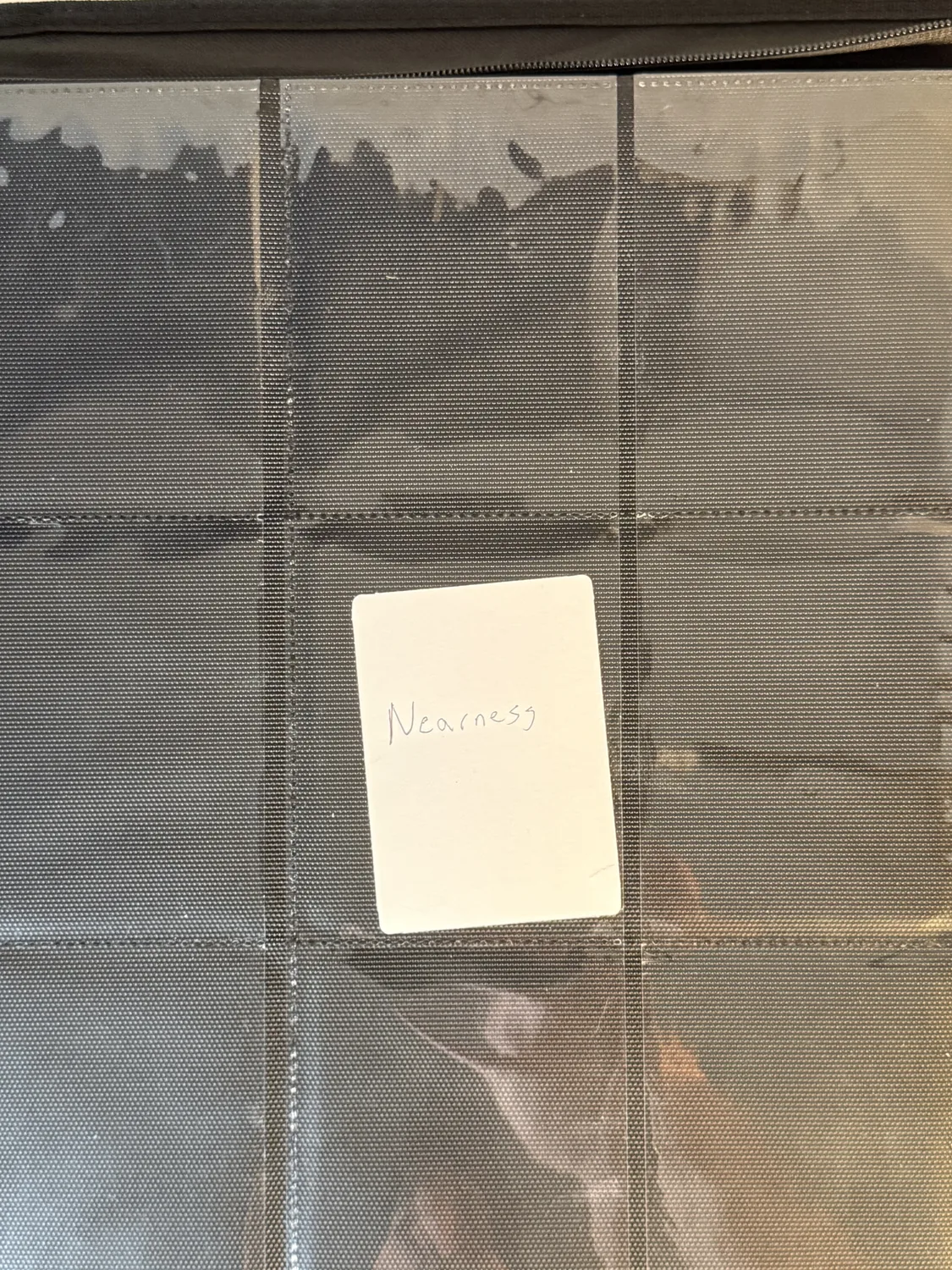 Nearness chapter divider card in a still-empty binder page
